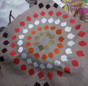 This roundel is only one of the unusual fabric patterns in stock.